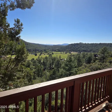 a balcony with an outdoor space