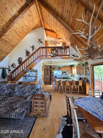 a view of a chairs and table in the patio