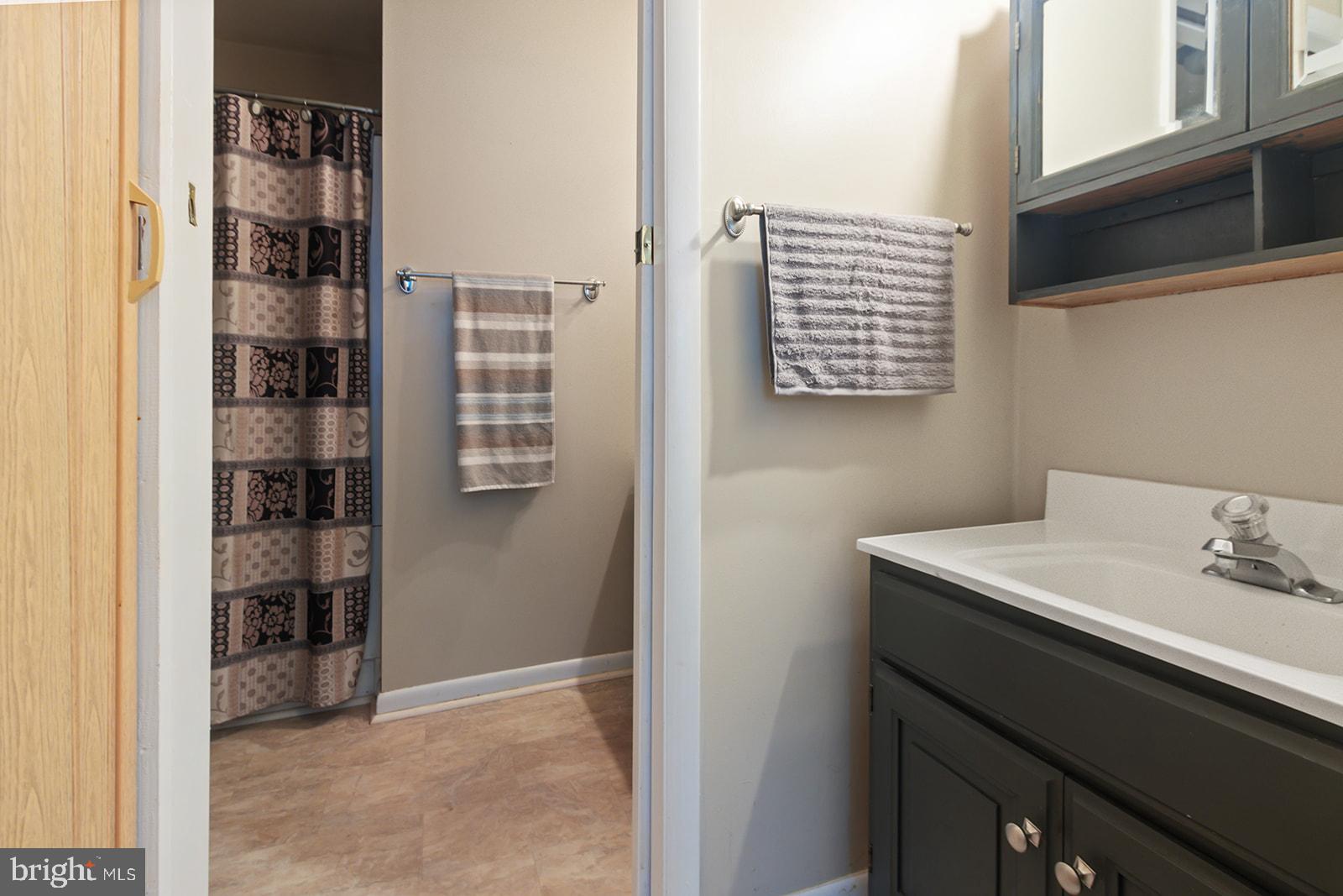 601 Grant Road, Unit 49 Folcroft, PA 19032 - Photo 20 of 39 bathroom with en suite entrance and vanity