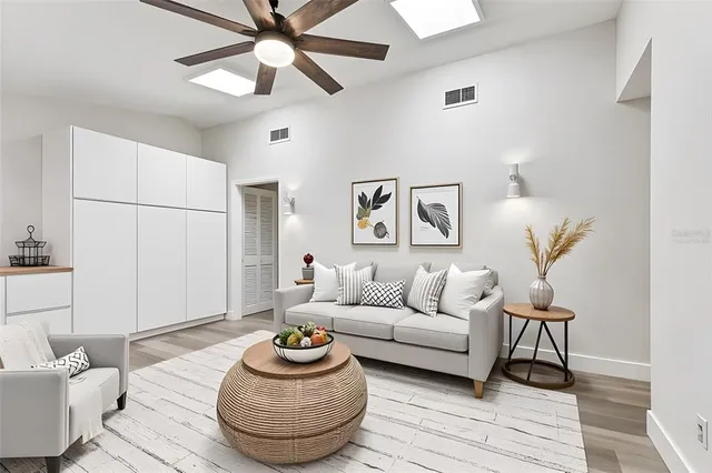 a bathroom with a double vanity sink a toilet and a mirror