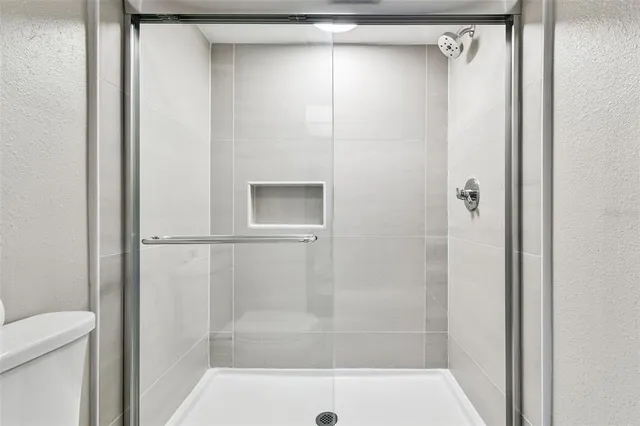 a view of a porch and garden