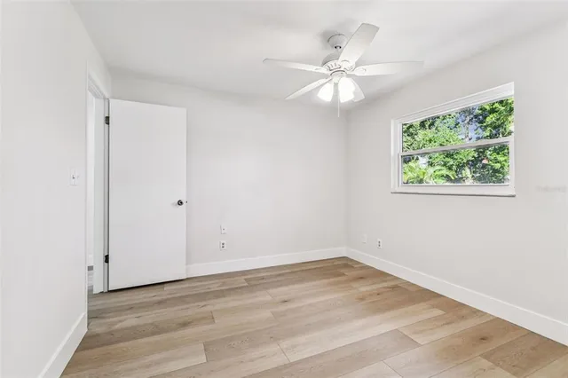 an aerial view of residential house with outdoor space