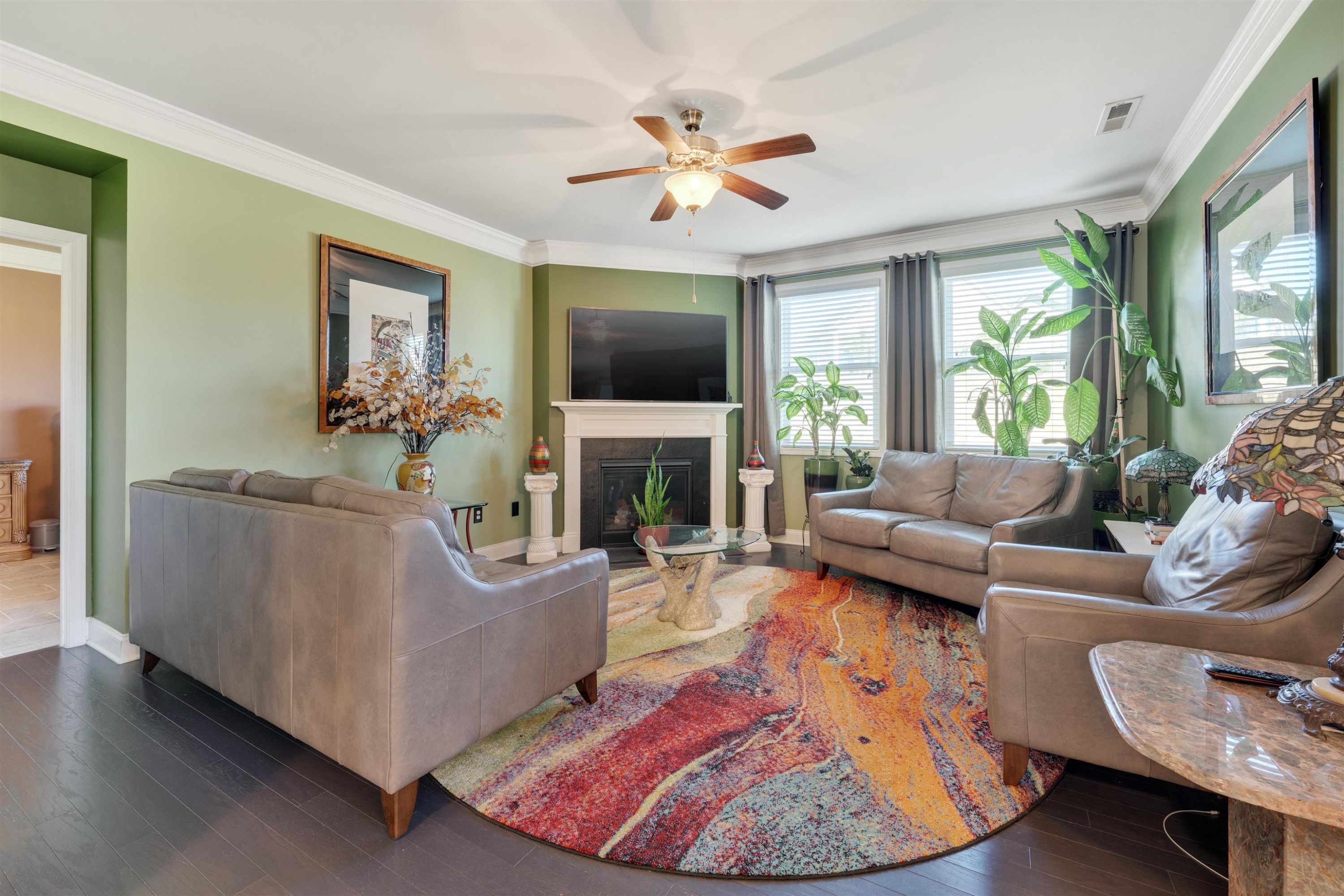 5317 Maplemoor Way Raleigh, NC 27616 - Photo 11 of 25 a living room with furniture and a fireplace