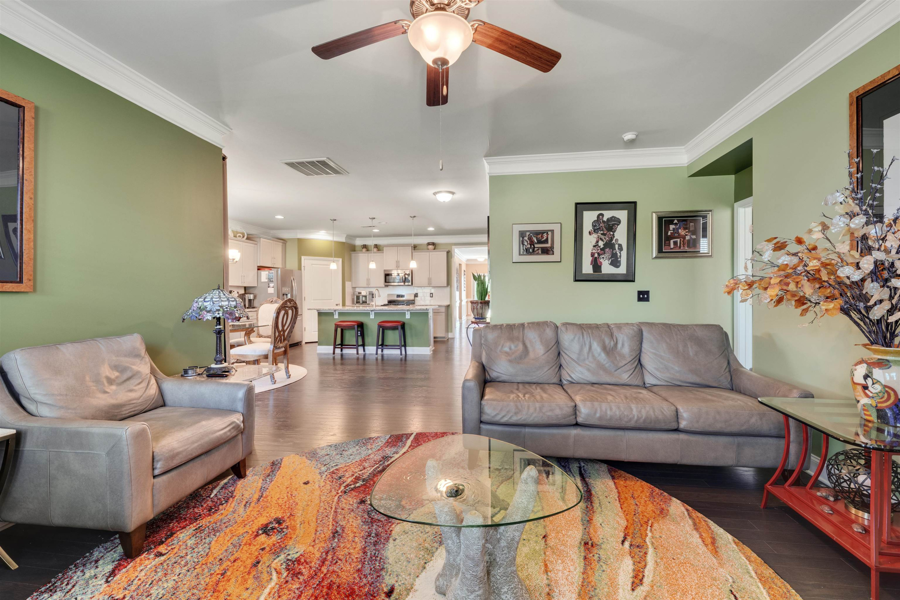 5317 Maplemoor Way Raleigh, NC 27616 - Photo 13 of 25 a living room with furniture and a chandelier