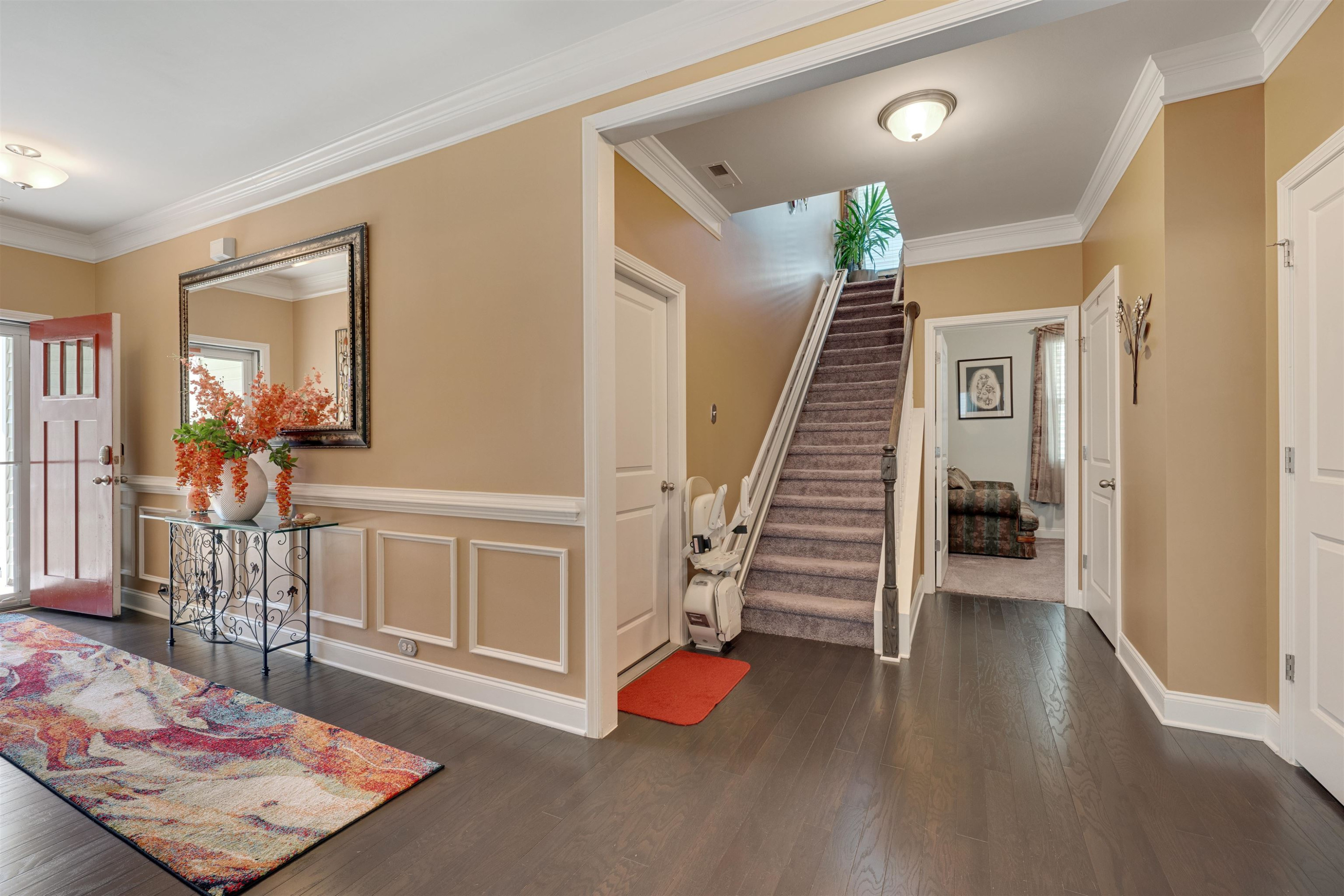 5317 Maplemoor Way Raleigh, NC 27616 - Photo 18 of 25 a view of entryway and hall with wooden floor