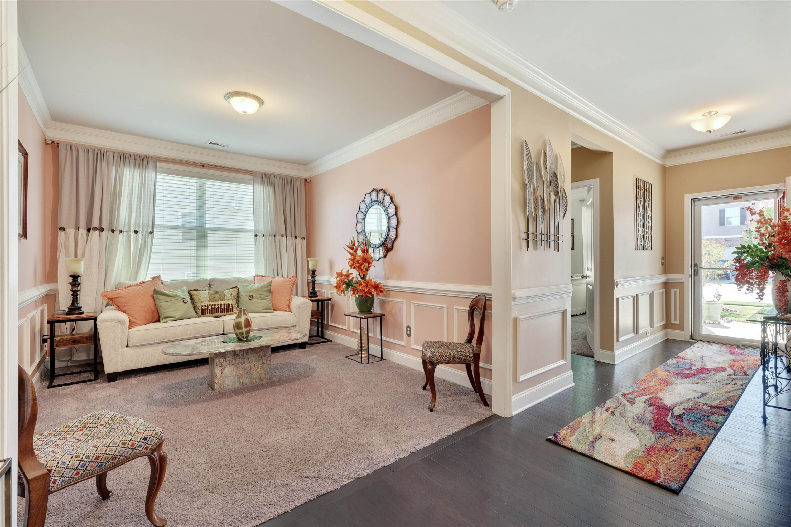 5317 Maplemoor Way Raleigh, NC 27616 - Photo 3 of 25 a living room with furniture and a potted plant
