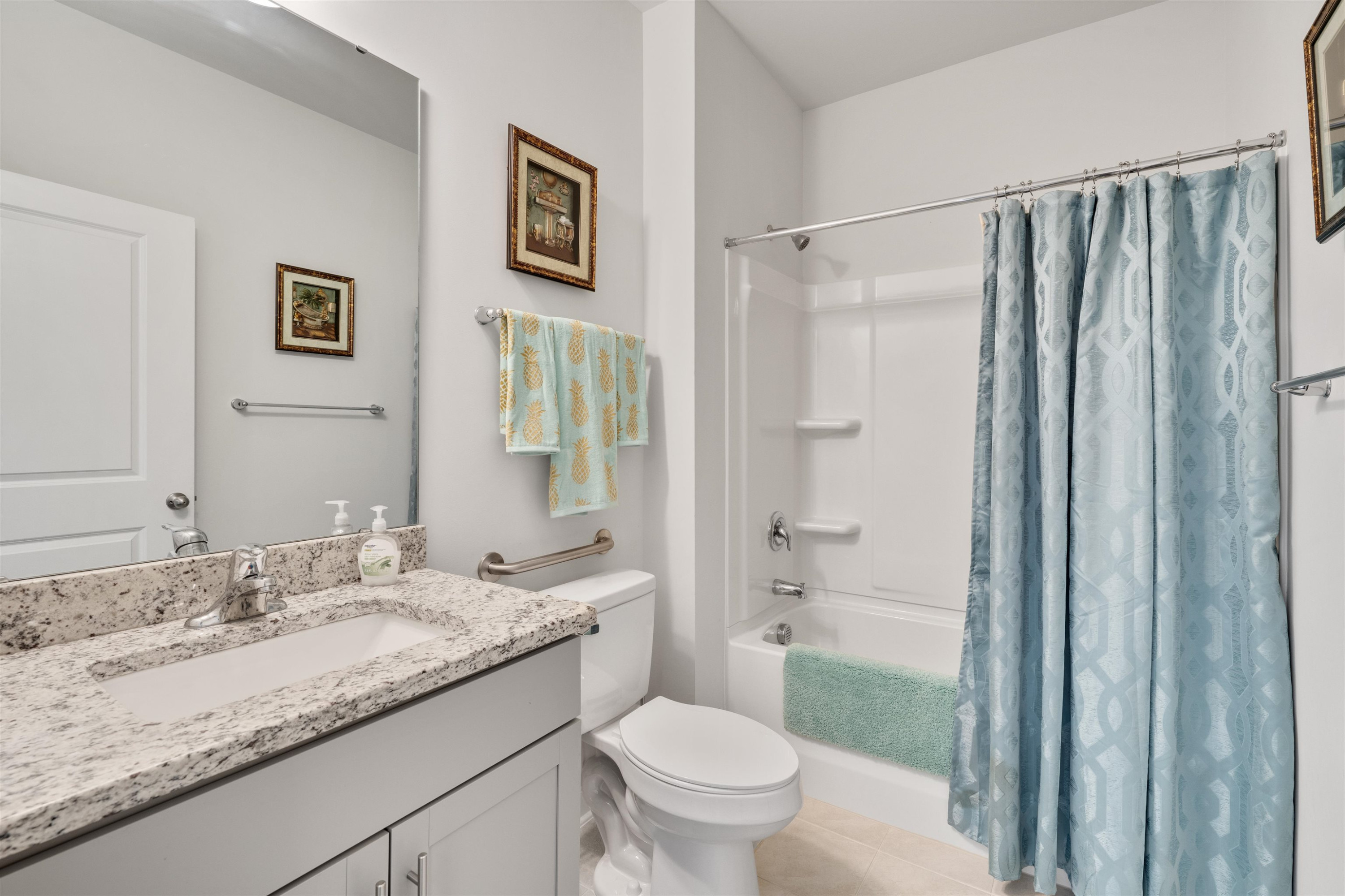 5317 Maplemoor Way Raleigh, NC 27616 - Photo 5 of 25 a bathroom with a granite countertop sink toilet and shower