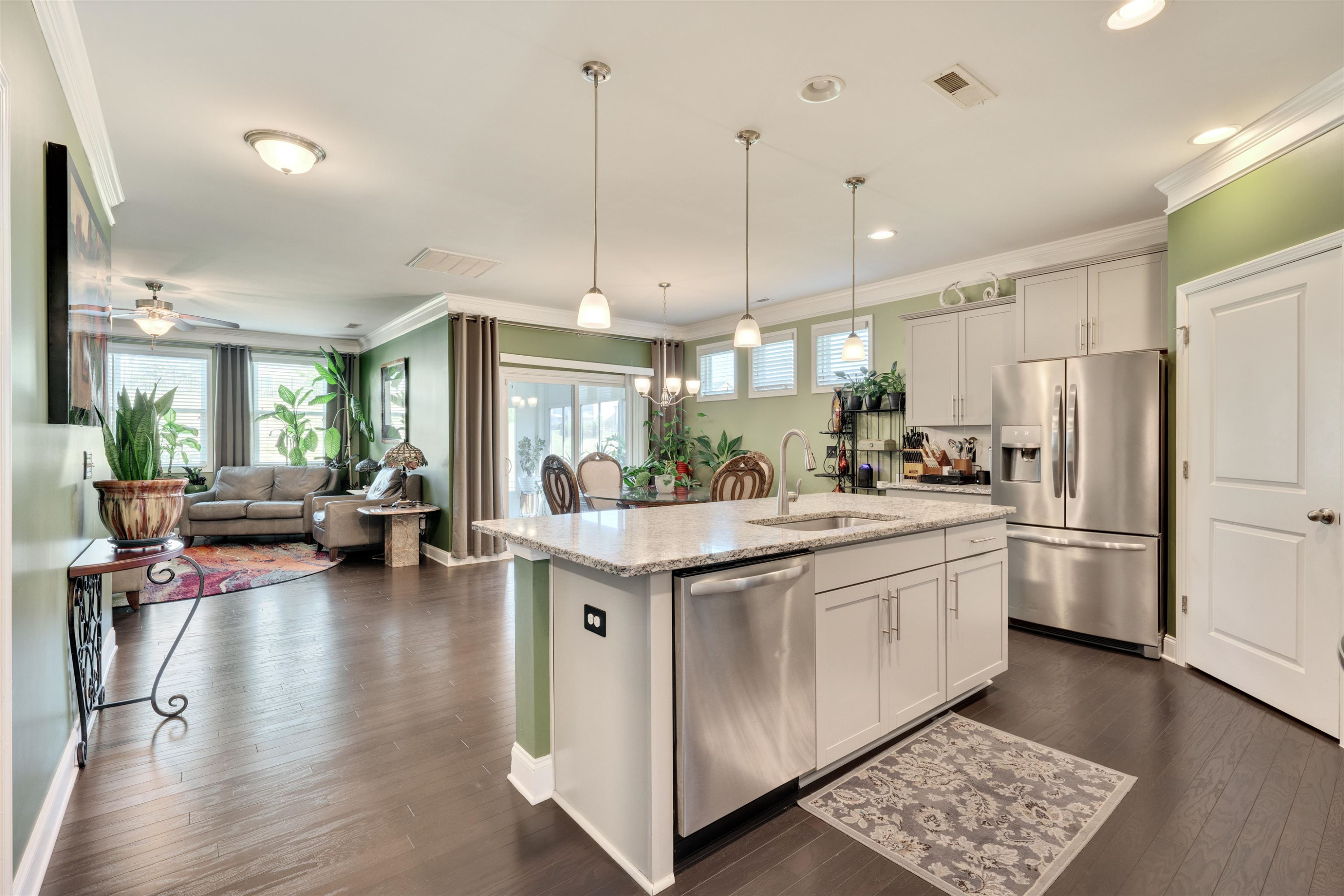 5317 Maplemoor Way Raleigh, NC 27616 - Photo 6 of 25 a kitchen with stainless steel appliances granite countertop a stove and refrigerator