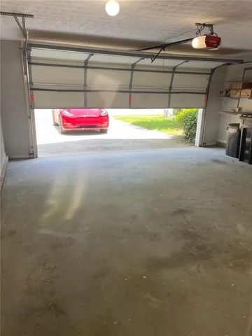 a view of small space and a garage