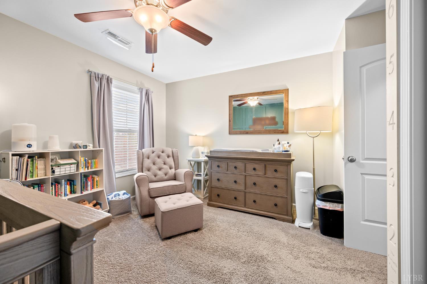 614 Carriage Parkway Rustburg, VA 24588 - Photo 30 of 44 a bedroom with a bed and a dresser