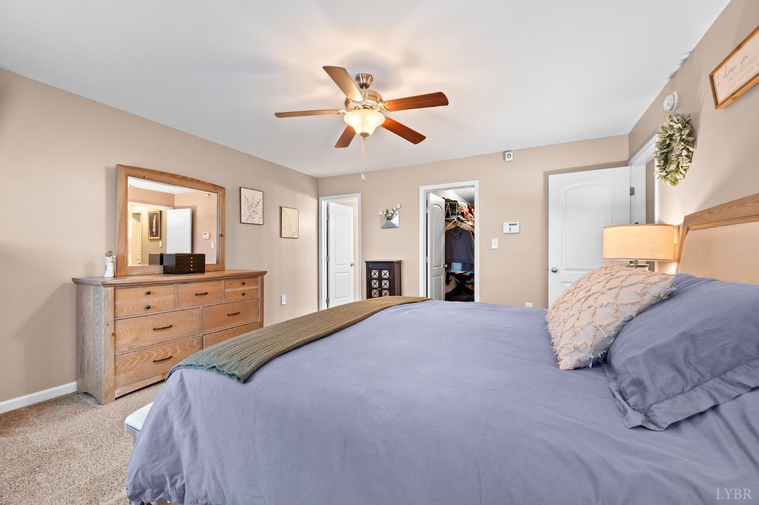 614 Carriage Parkway Rustburg, VA 24588 - Photo 33 of 44 a bedroom with a large bed and a window