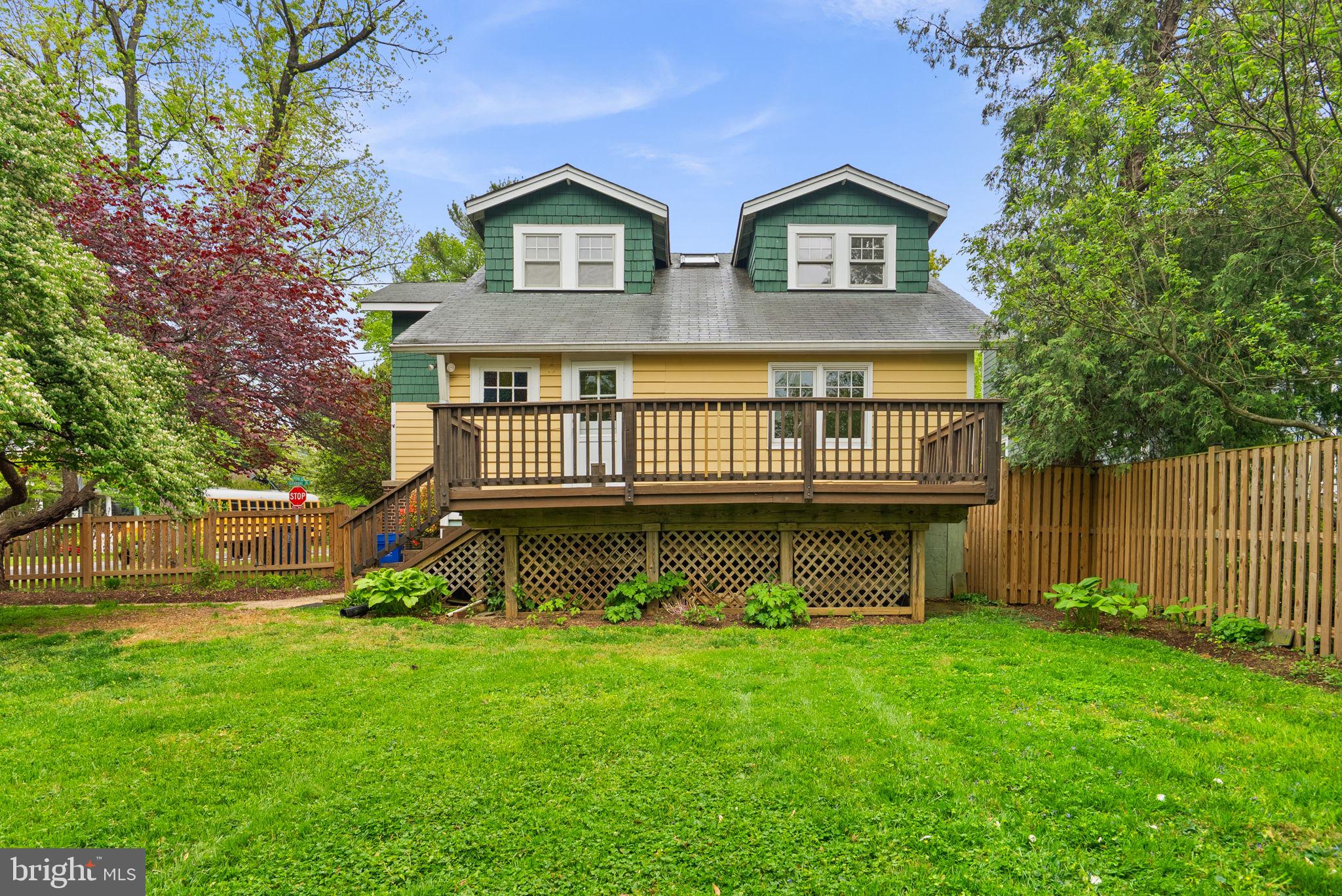 9120 Glenridge Road Silver Spring, MD 20910 - Photo 52 of 59 a front view of a house with a garden and yard