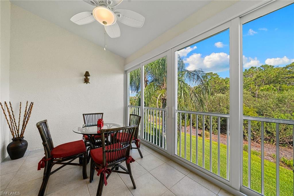 23785 Clear Spring Court, Unit 2305 Estero, FL 34135 - Photo 22 of 30 a view of a dining room with furniture window and outside view