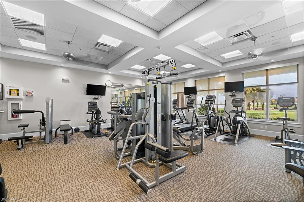 23785 Clear Spring Court, Unit 2305 Estero, FL 34135 - Photo 26 of 30 a view of a room with gym equipment