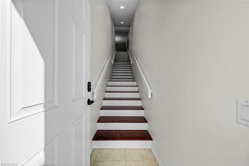 23785 Clear Spring Court, Unit 2305 Estero, FL 34135 - Photo 3 of 30 a view of entryway and hall with wooden floor