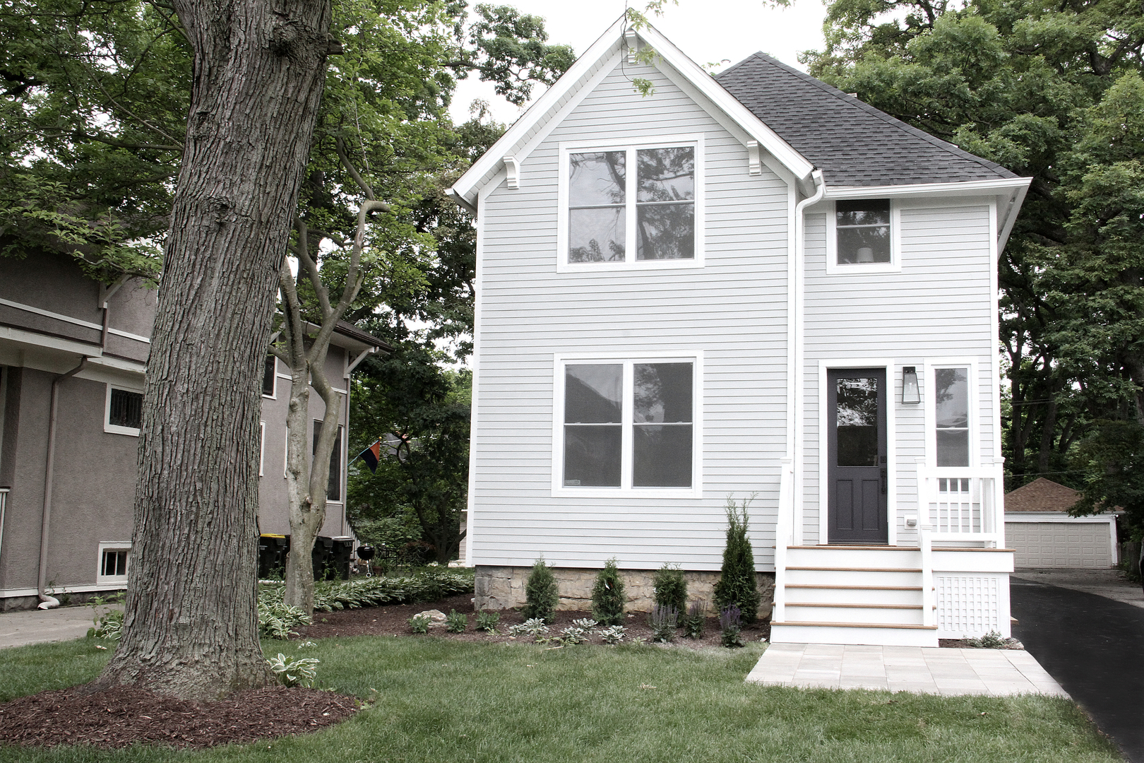 148 Barrypoint Road Riverside, IL 60546 - Photo 1 of 30 a front view of a house with a yard