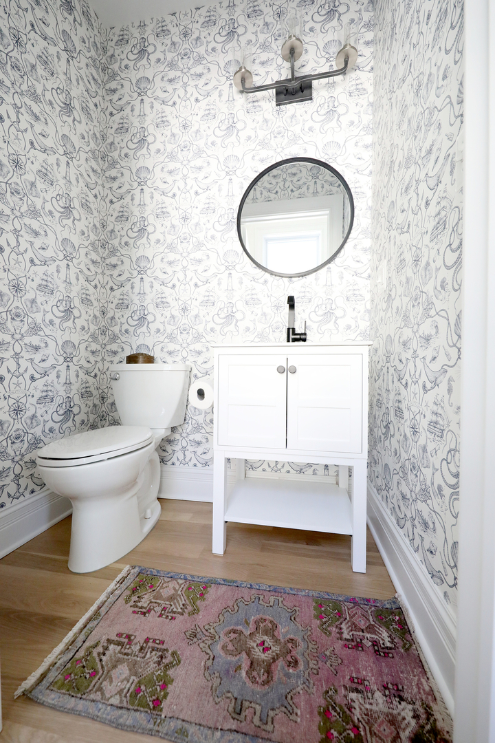 148 Barrypoint Road Riverside, IL 60546 - Photo 18 of 30 a bathroom with a toilet and a mirror