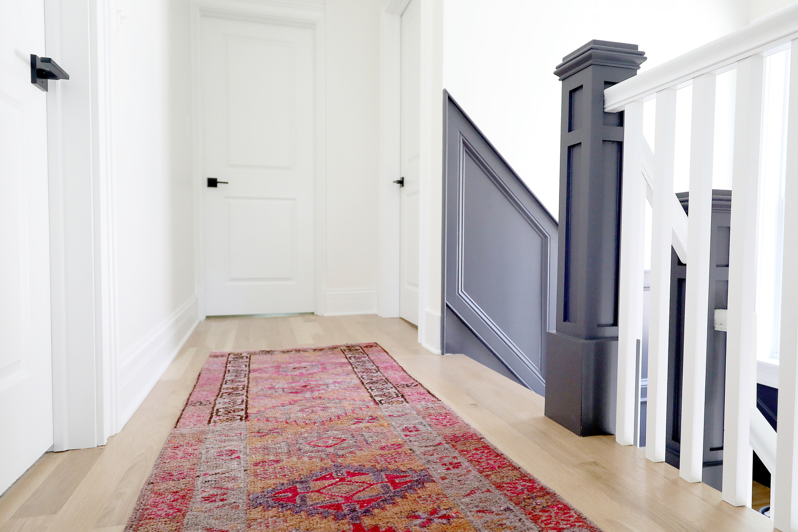 148 Barrypoint Road Riverside, IL 60546 - Photo 22 of 30 a view of hallway with wooden floor and a rug