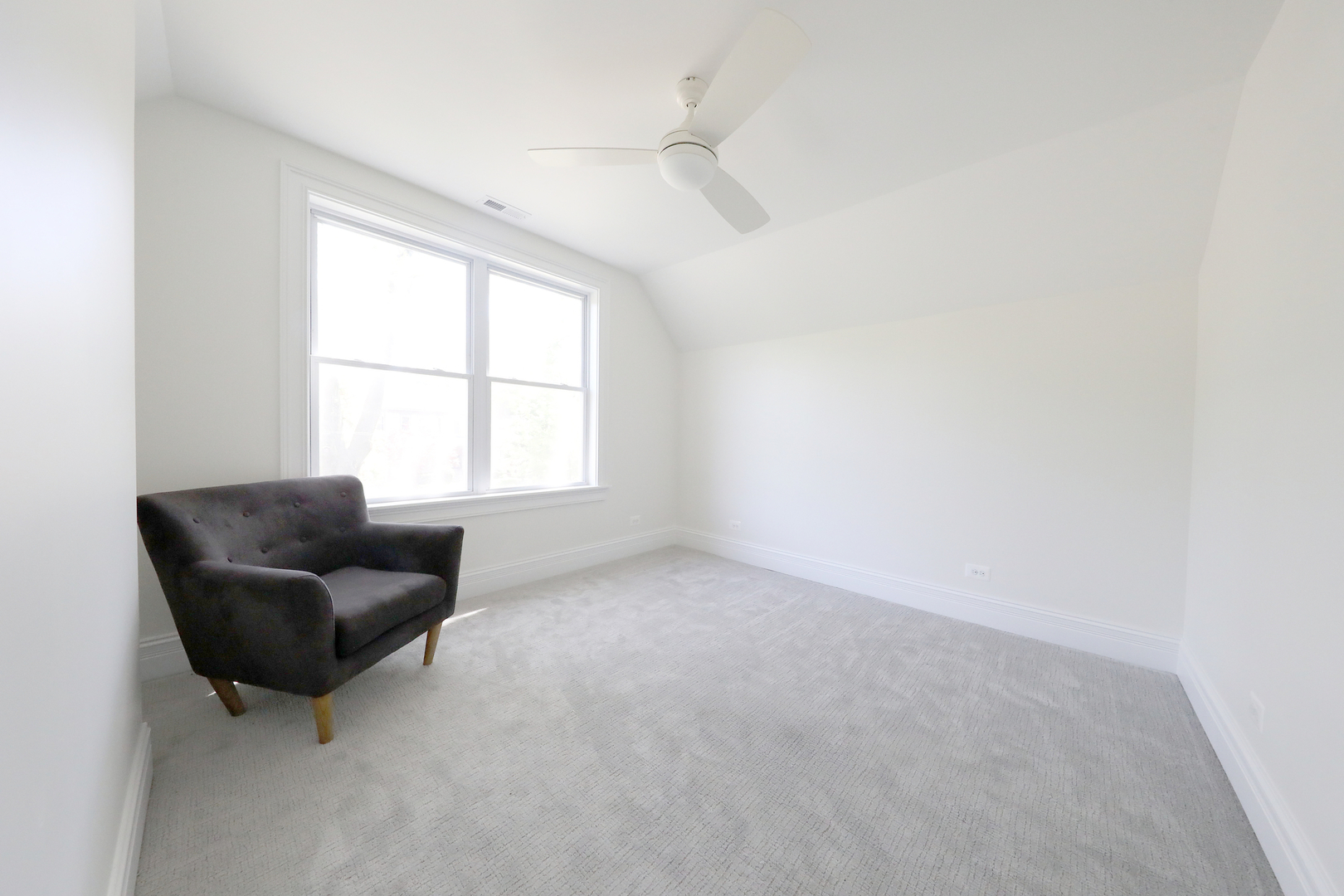 148 Barrypoint Road Riverside, IL 60546 - Photo 24 of 30 an empty room with a window and a couch