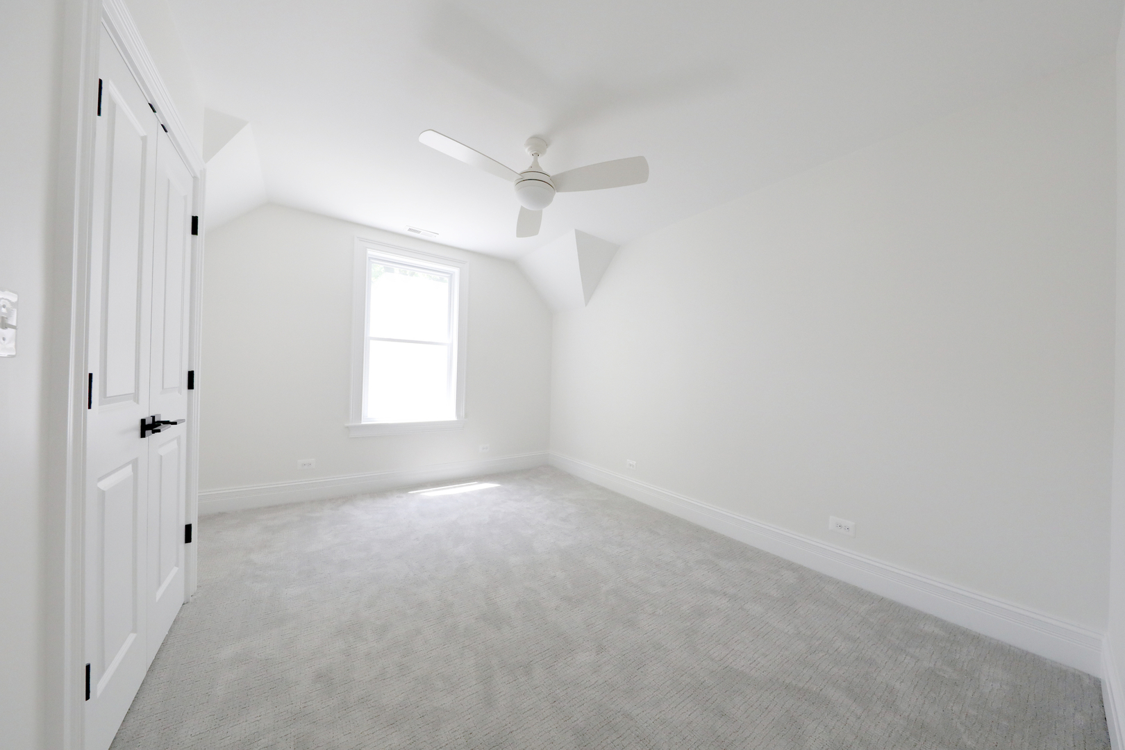 148 Barrypoint Road Riverside, IL 60546 - Photo 25 of 30 an empty room with windows and fan