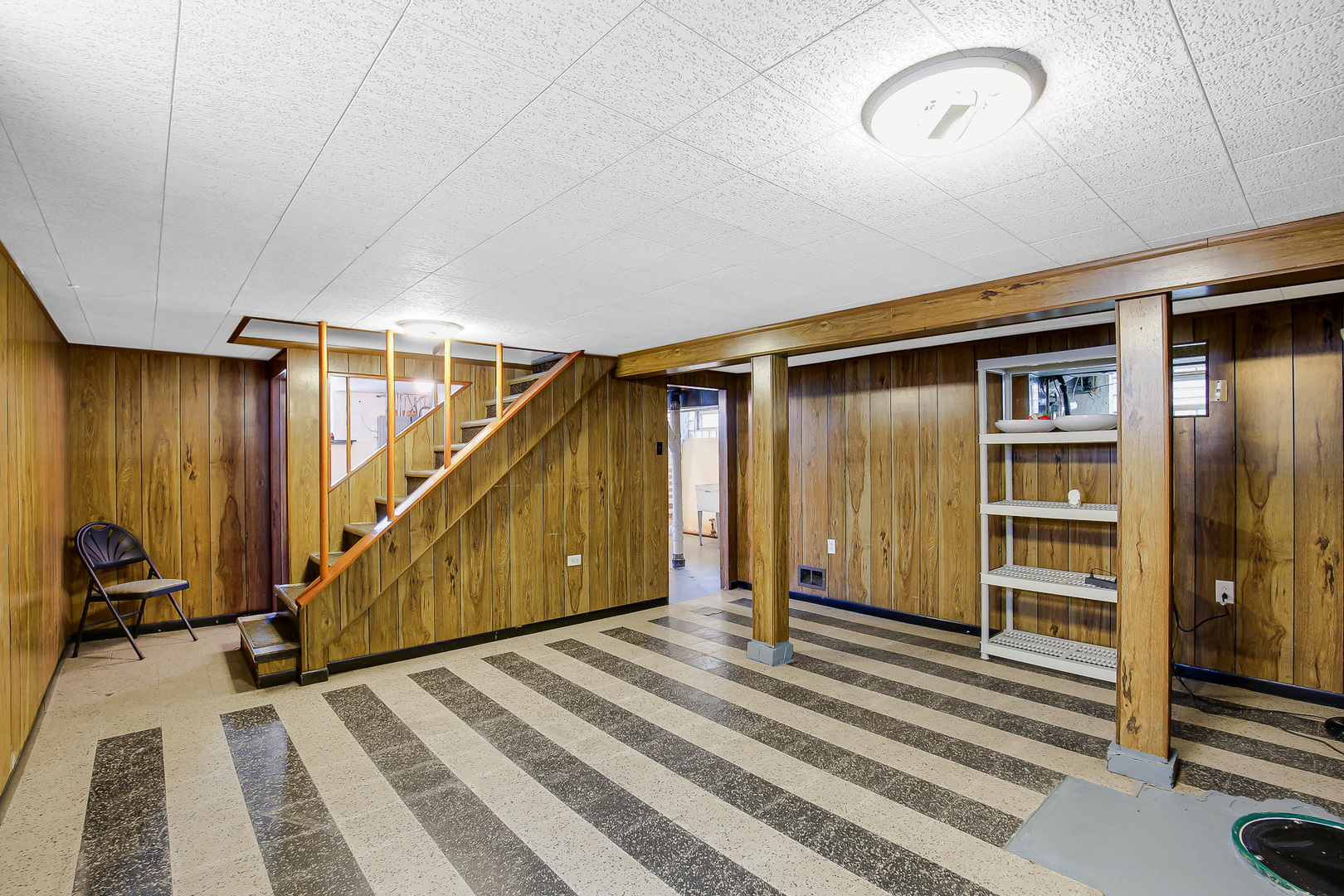 10922 South Ave B Chicago, IL 60617 - Photo 20 of 24 a view of a livingroom with stairs and furniture