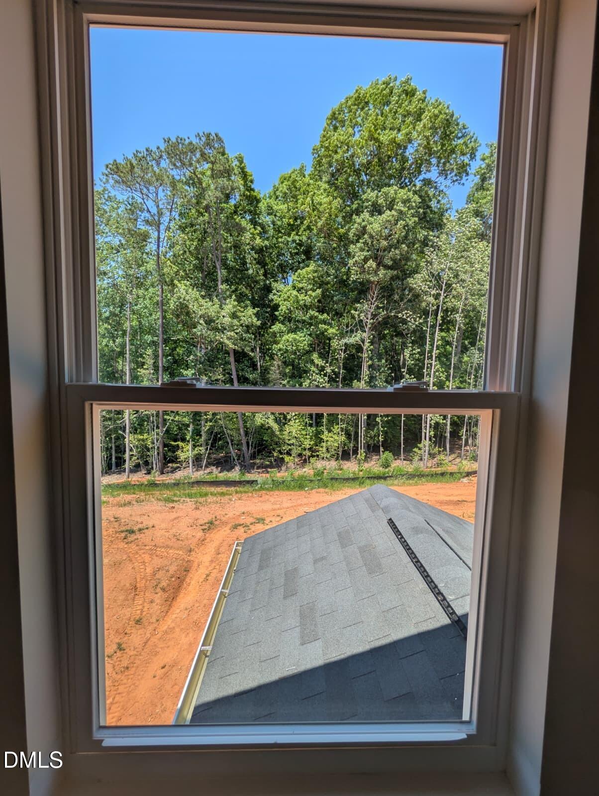 308 Karlov Road Garner, NC 27529 - Photo 27 of 55 a view of a small yard from a window