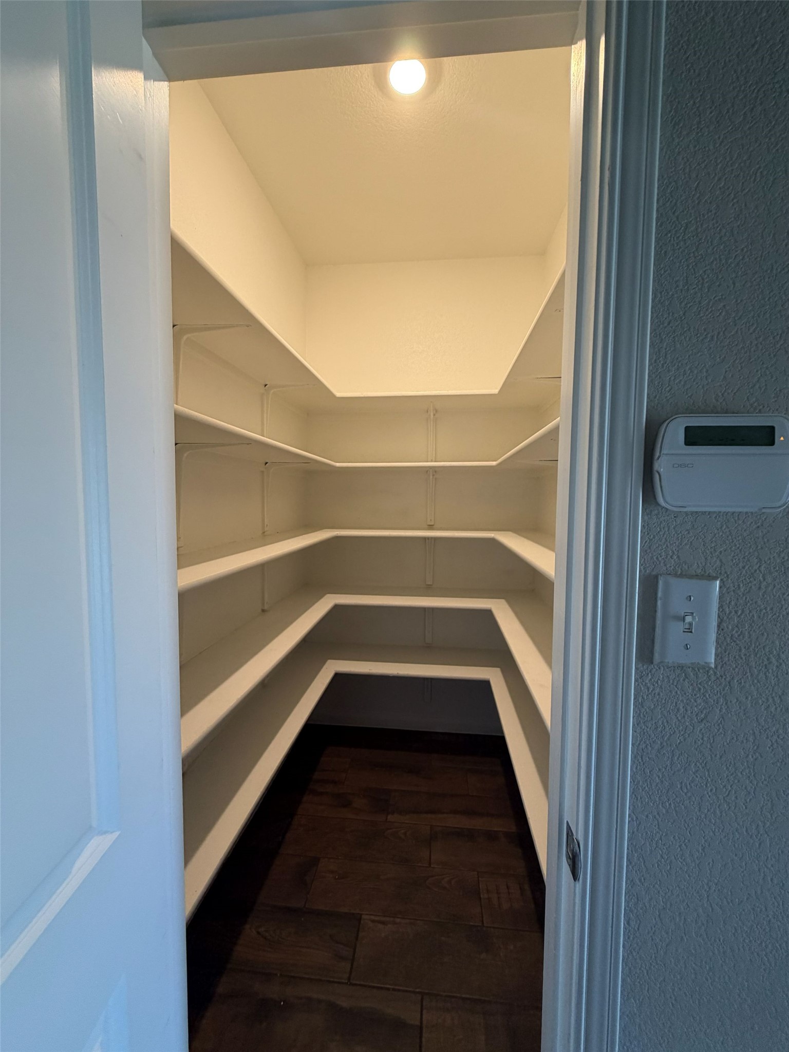 248 Falling Star Lane Georgetown, TX 78628 - Photo 2 of 16 Ample shelving creates an organized space for all your culinary provisions.