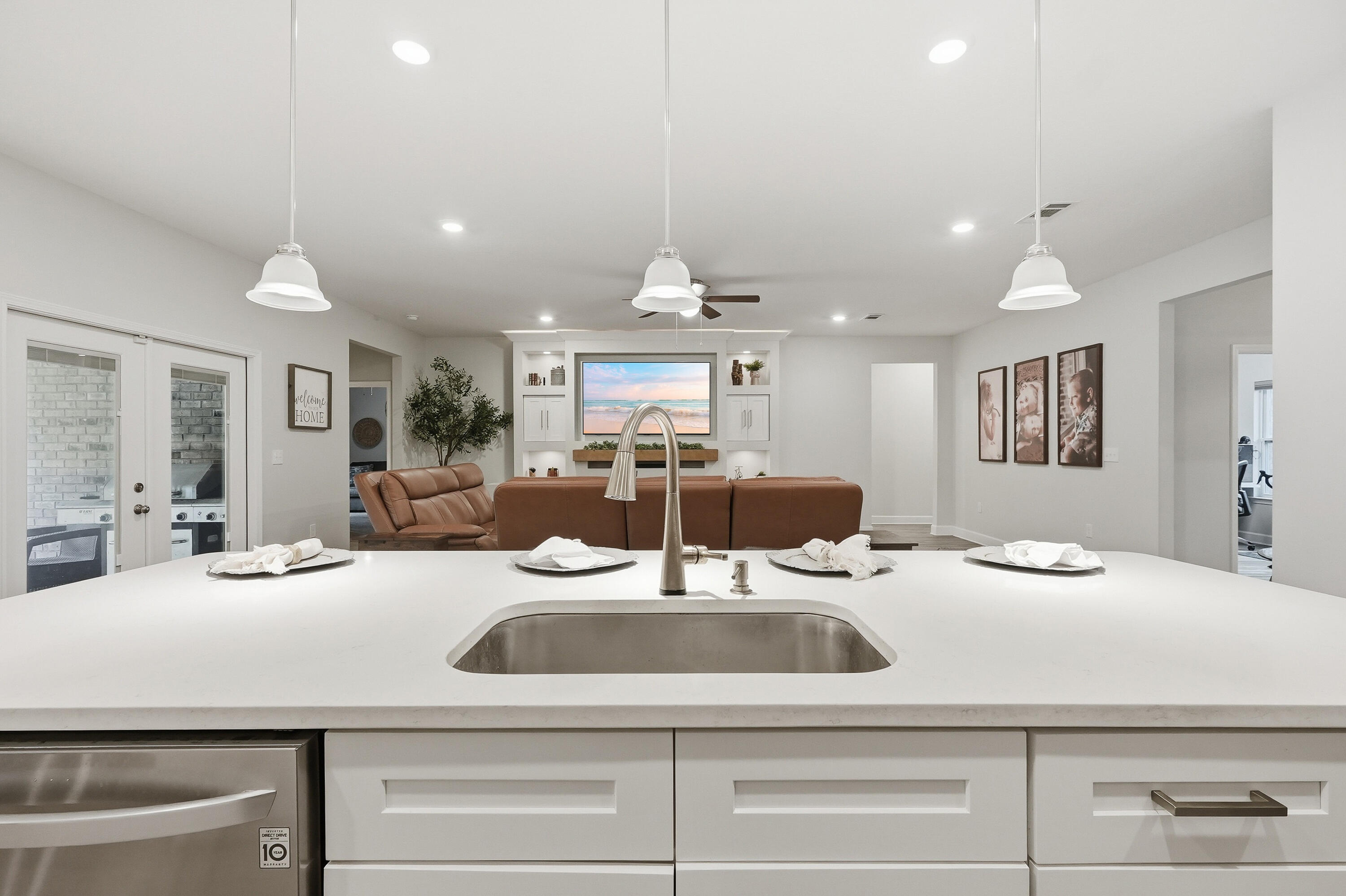 5833 La Porte Road Crestview, FL 32539 - Photo 20 of 44 a kitchen with a sink and living room view