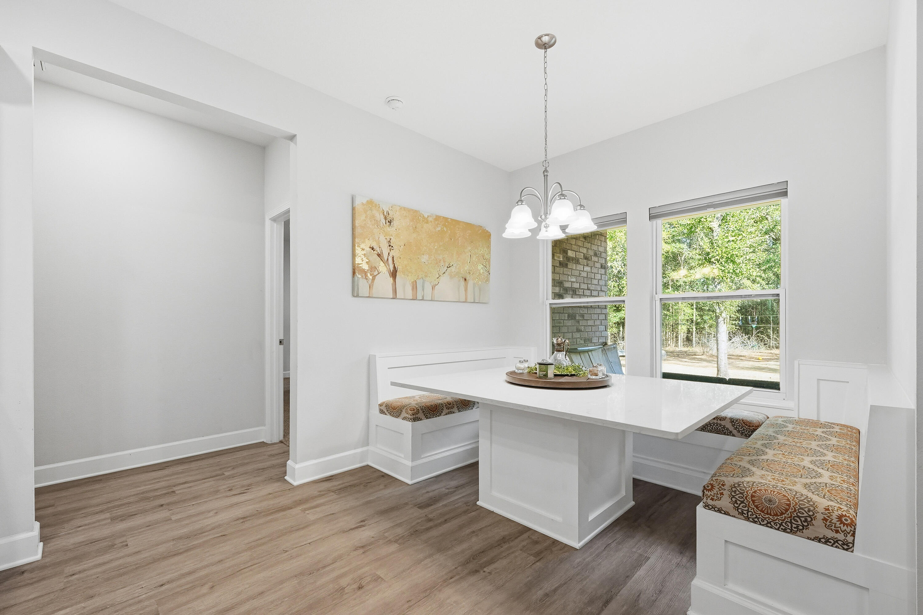 5833 La Porte Road Crestview, FL 32539 - Photo 23 of 44 a living room with furniture and a chandelier