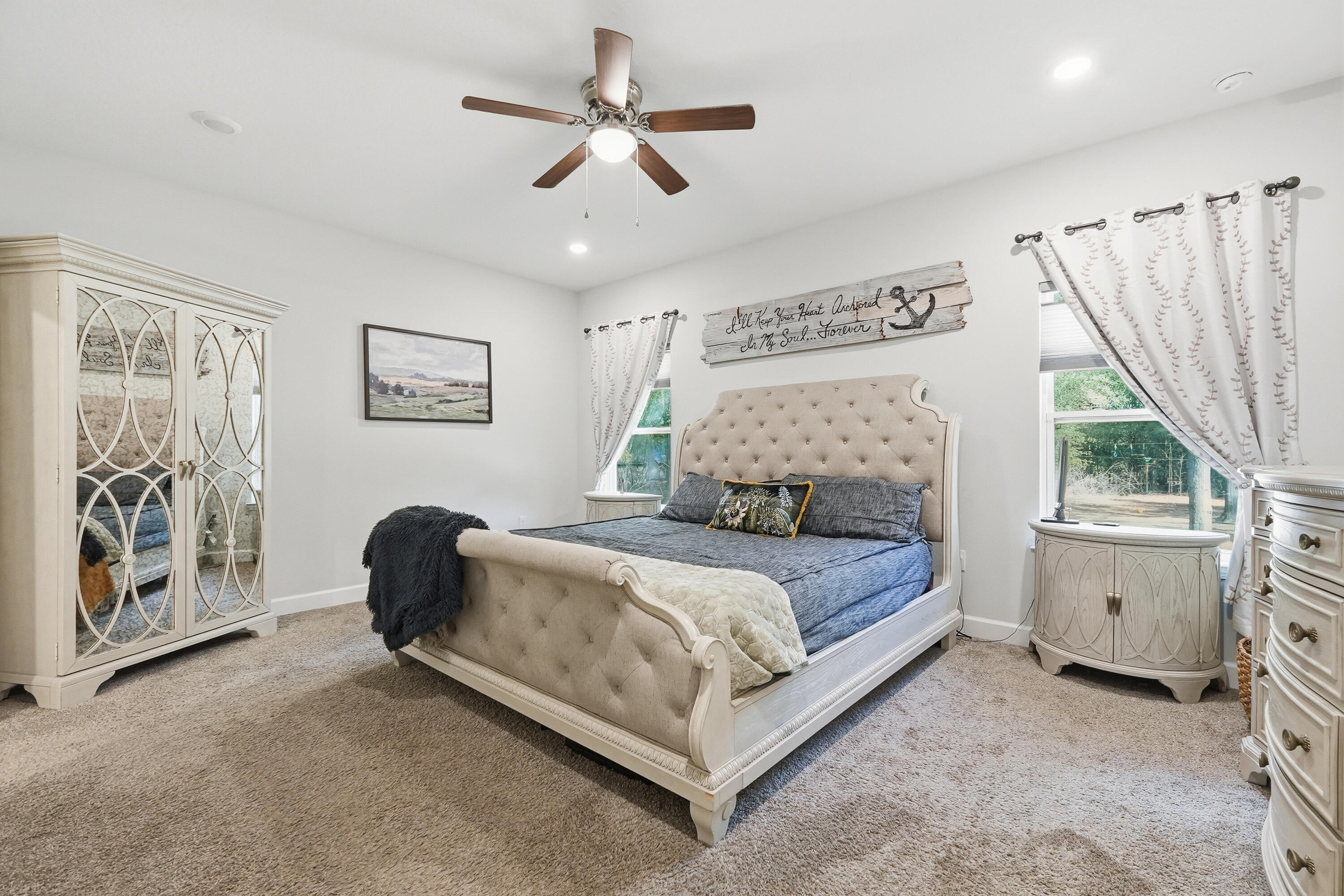 5833 La Porte Road Crestview, FL 32539 - Photo 24 of 44 a bedroom with a bed and a large window