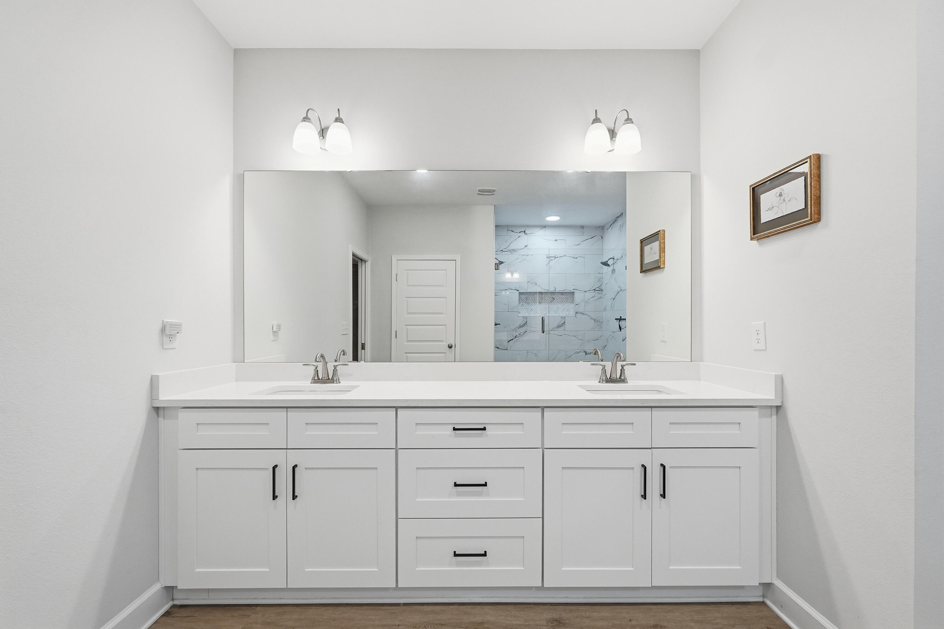 5833 La Porte Road Crestview, FL 32539 - Photo 27 of 44 a bathroom with a sink vanity and mirror