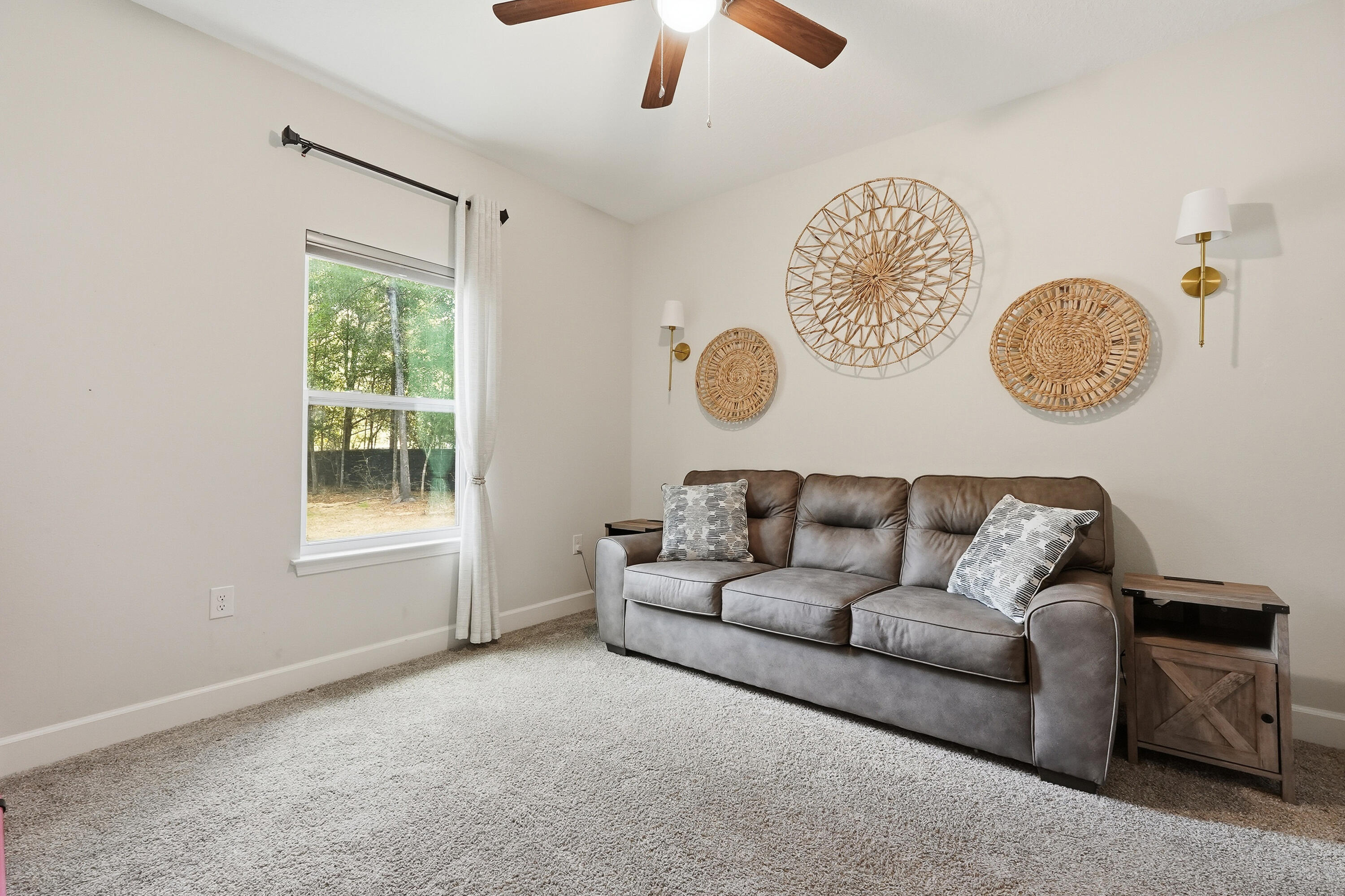 5833 La Porte Road Crestview, FL 32539 - Photo 33 of 44 a living room with a couch and a window