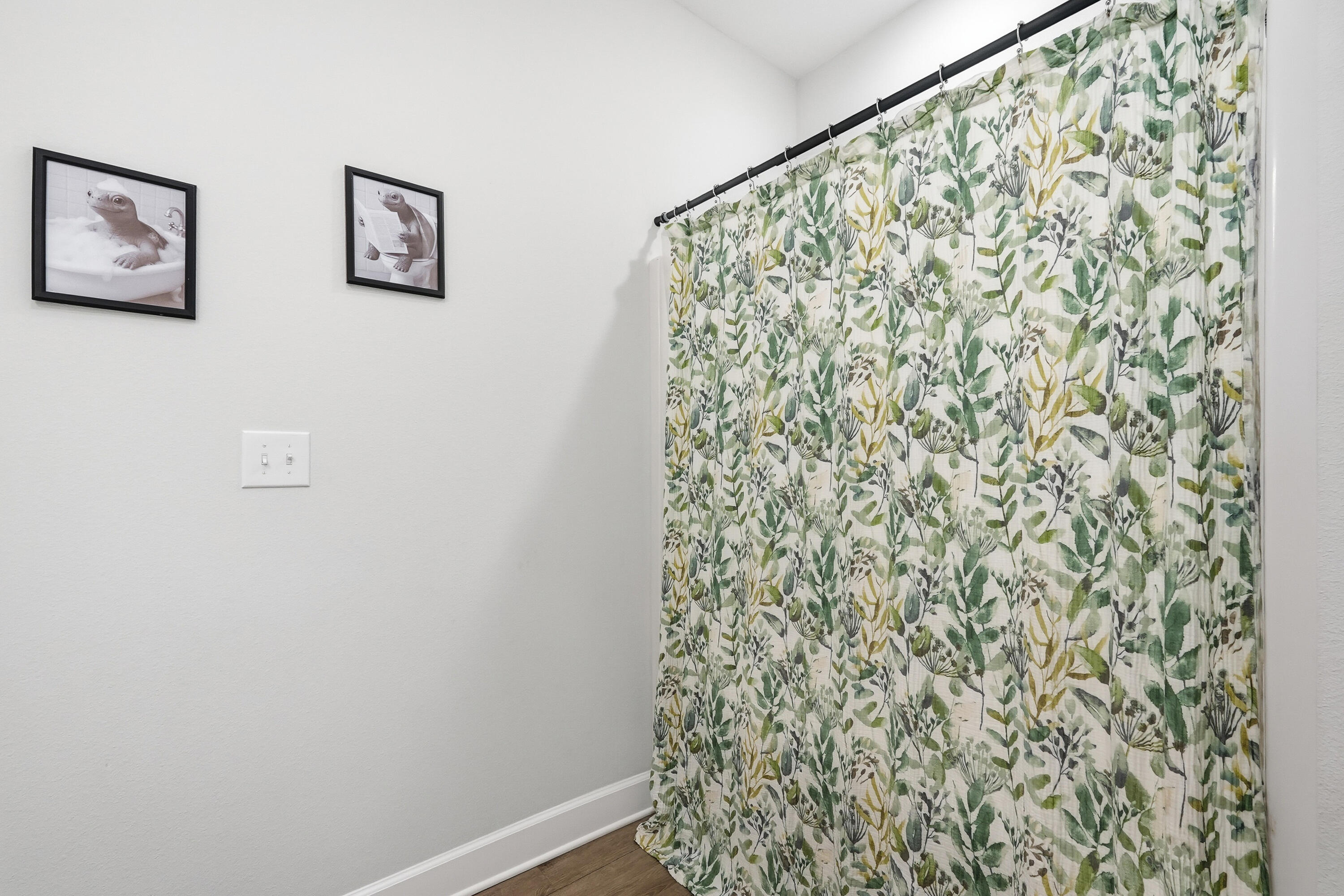 5833 La Porte Road Crestview, FL 32539 - Photo 37 of 44 a bathroom with a shower curtain and a window