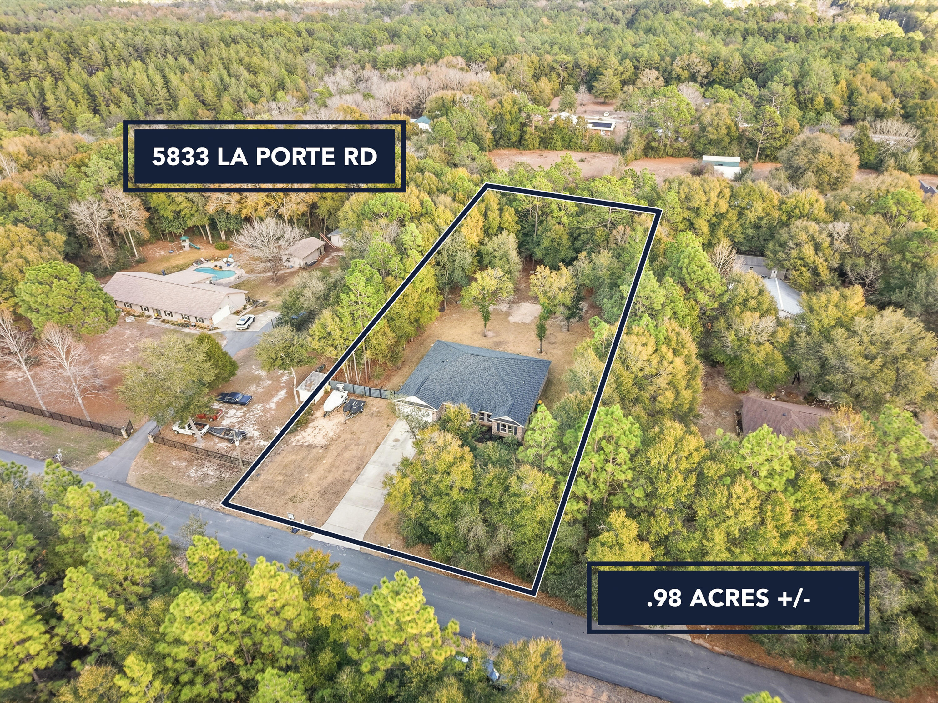 5833 La Porte Road Crestview, FL 32539 - Photo 5 of 44 a sign broad on the side of the road