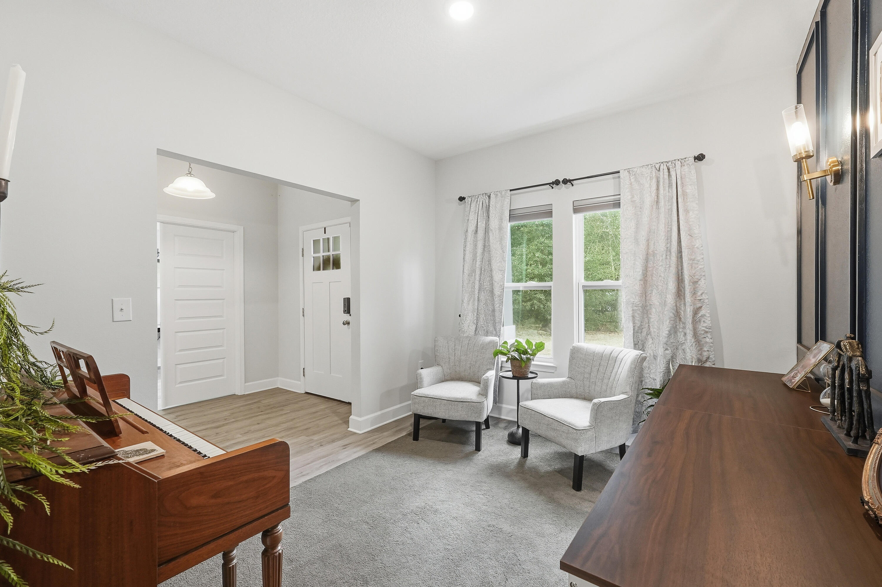 5833 La Porte Road Crestview, FL 32539 - Photo 9 of 44 a living room with furniture and a window