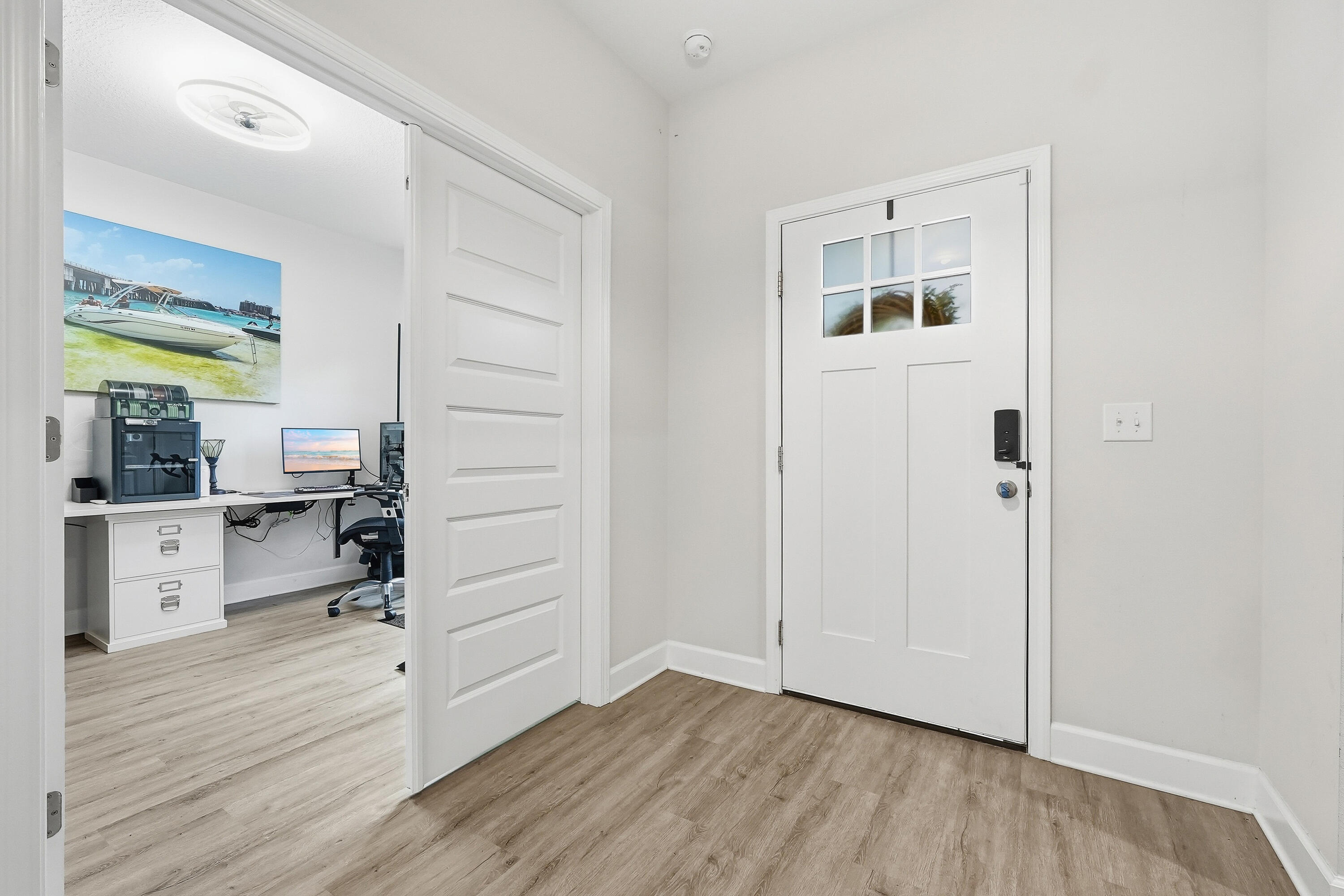 5833 La Porte Road Crestview, FL 32539 - Photo 10 of 44 a view of a hallway with wooden floor and closet