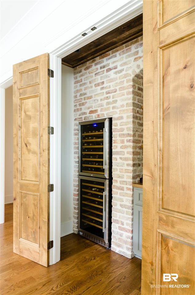 533 Falling Water Boulevard Fairhope, AL 36532 - Photo 11 of 50 Two Wine Refrigerators, Custom Made Barn Doors