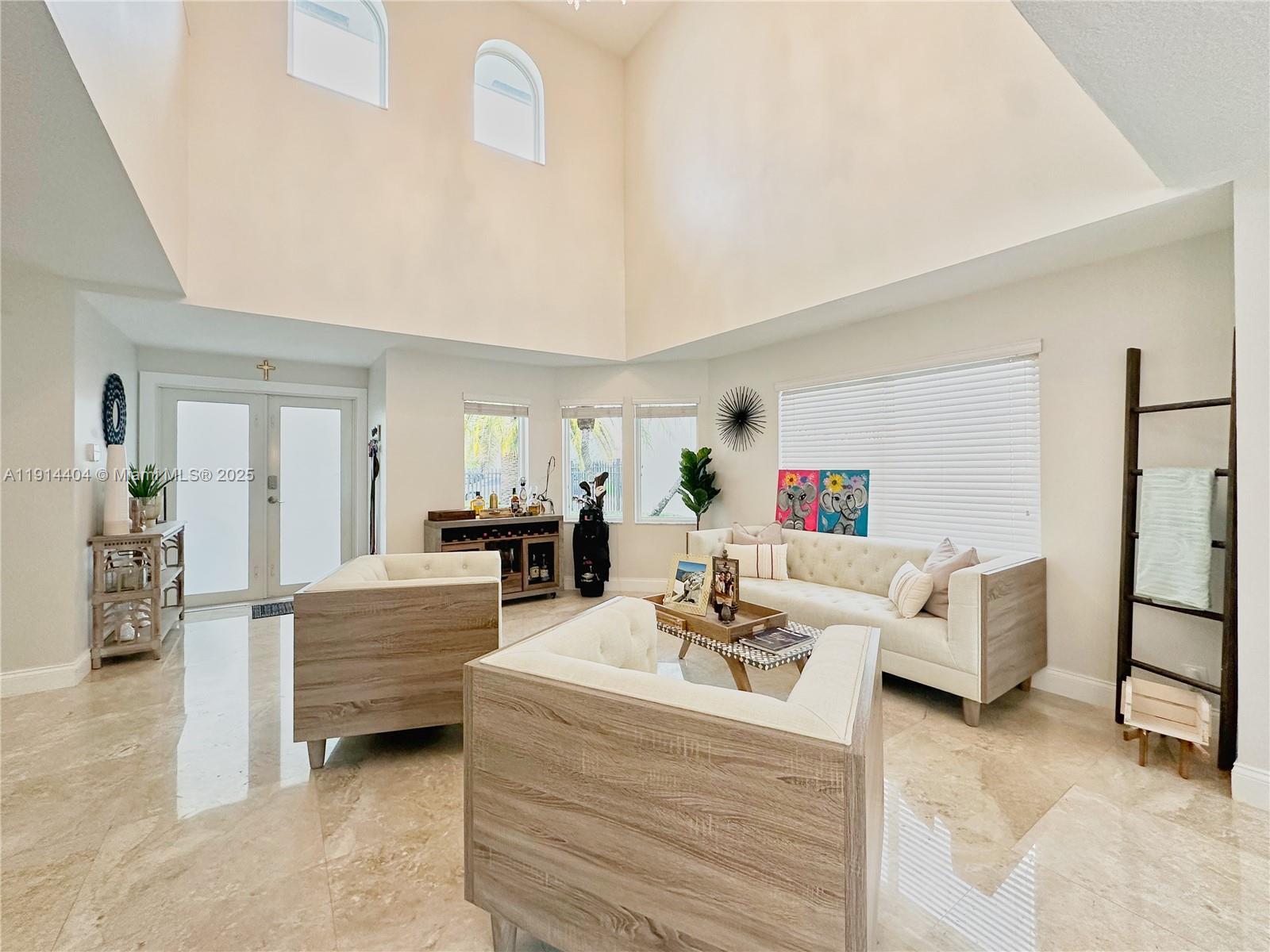 a living room with furniture and a table