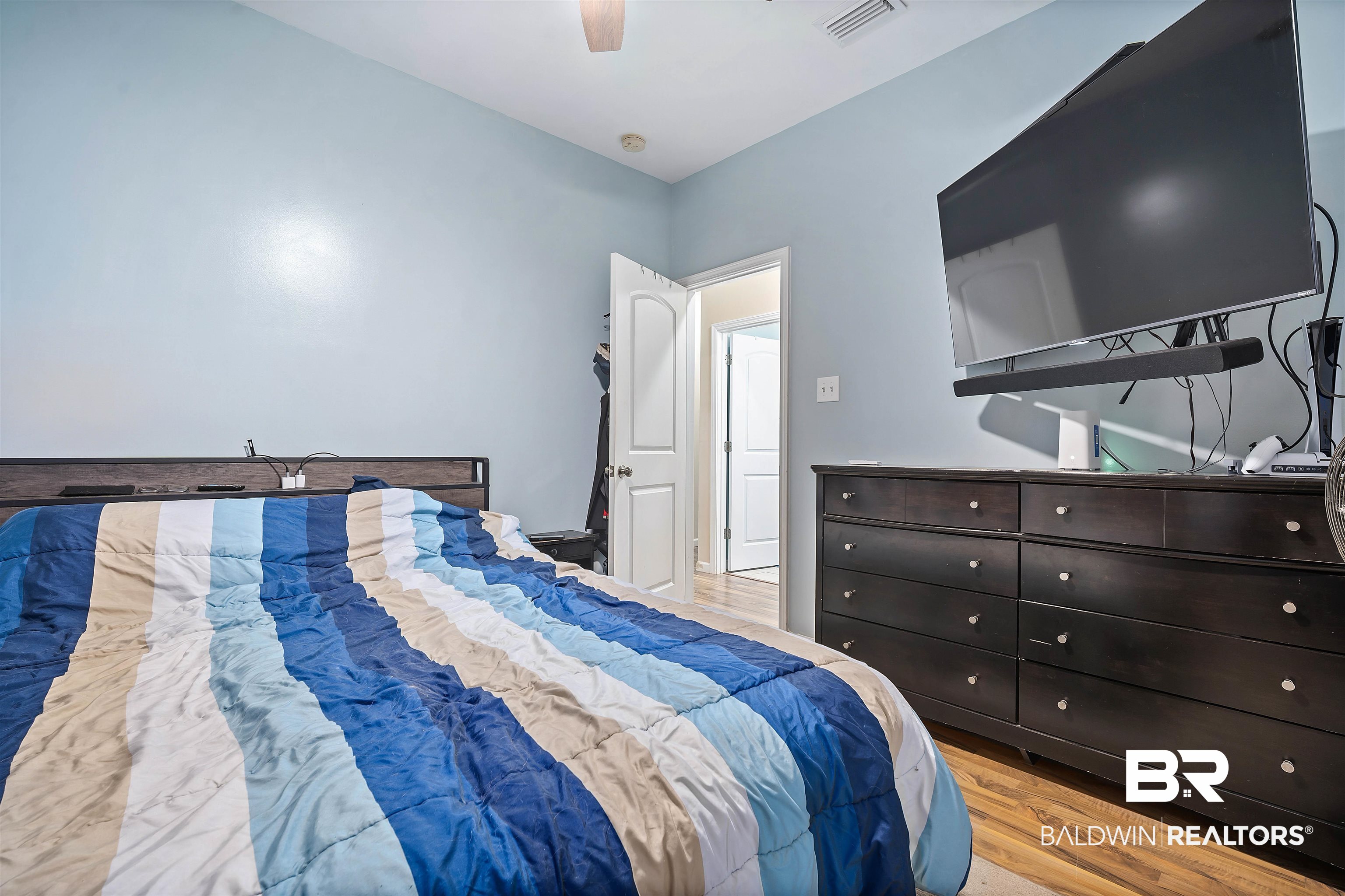 209 Maplewood Loop Daphne, AL 36526 - Photo 18 of 23 Bedroom with light wood-style floors and ceiling fan