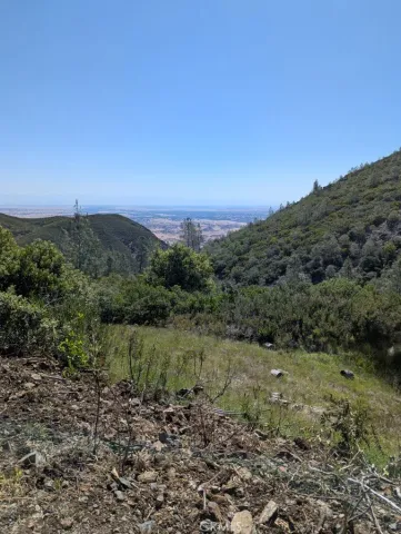 a view of a lake with mountains in the background