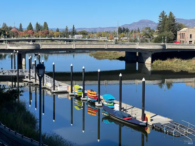 a view of a chairs and table in patio