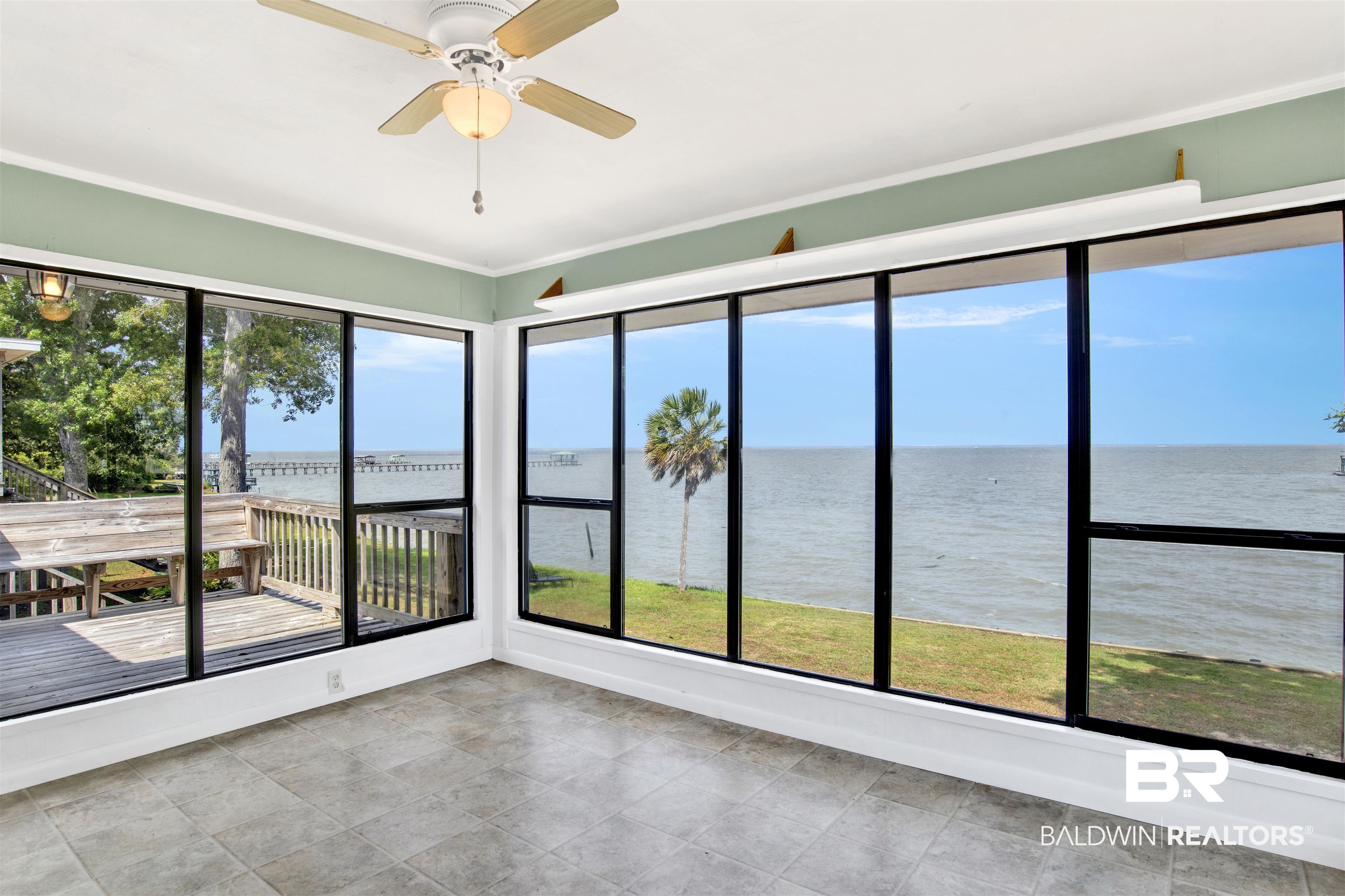 7411 Bay Road Mobile, AL 36605 - Photo 19 of 34 Unfurnished sunroom with a water view