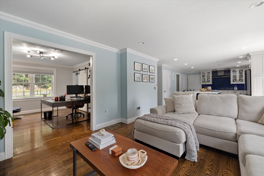 7 Beaman Lane Marlborough, MA 01752 - Photo 16 of 42 a living room with furniture and a table