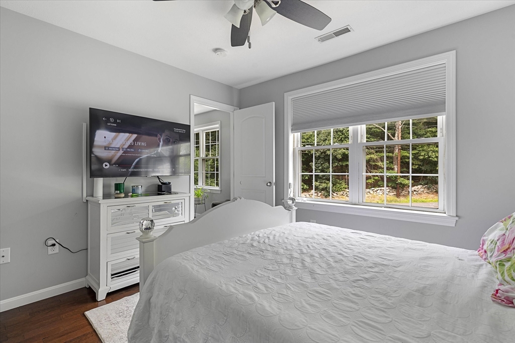 7 Beaman Lane Marlborough, MA 01752 - Photo 22 of 42 a bedroom with a bed and a window