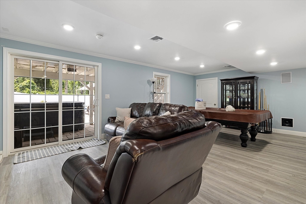 7 Beaman Lane Marlborough, MA 01752 - Photo 29 of 42 a living room with furniture and a window