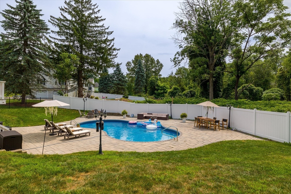 7 Beaman Lane Marlborough, MA 01752 - Photo 38 of 42 a view of a backyard with sitting area
