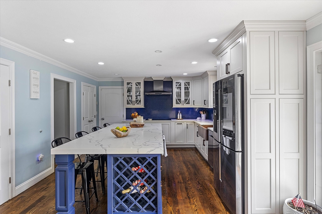 7 Beaman Lane Marlborough, MA 01752 - Photo 8 of 42 a view of a dining room with furniture and wooden floor