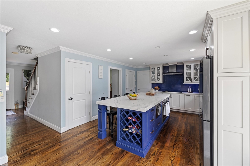 7 Beaman Lane Marlborough, MA 01752 - Photo 9 of 42 a open kitchen with a sink and a refrigerator