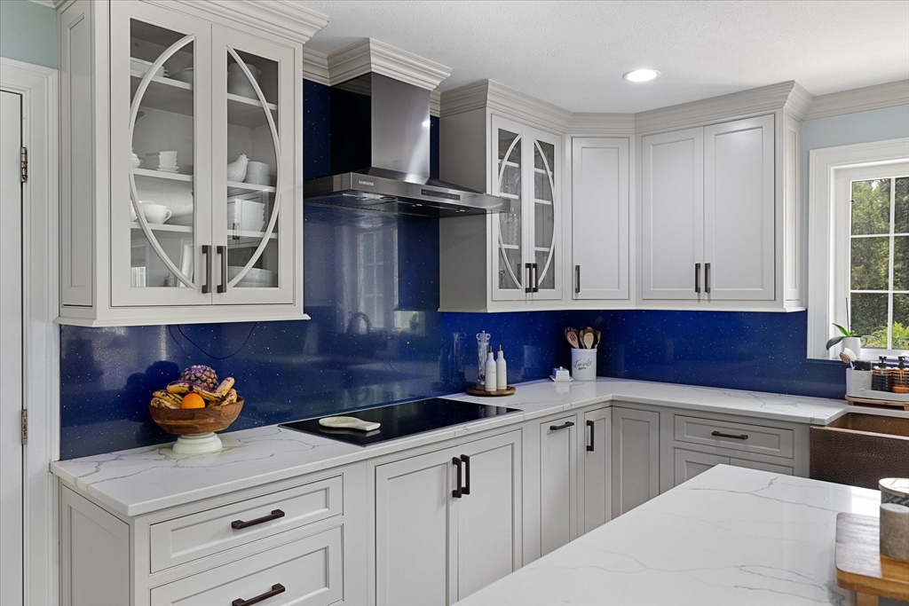7 Beaman Lane Marlborough, MA 01752 - Photo 10 of 42 a kitchen with stainless steel appliances cabinets and a window