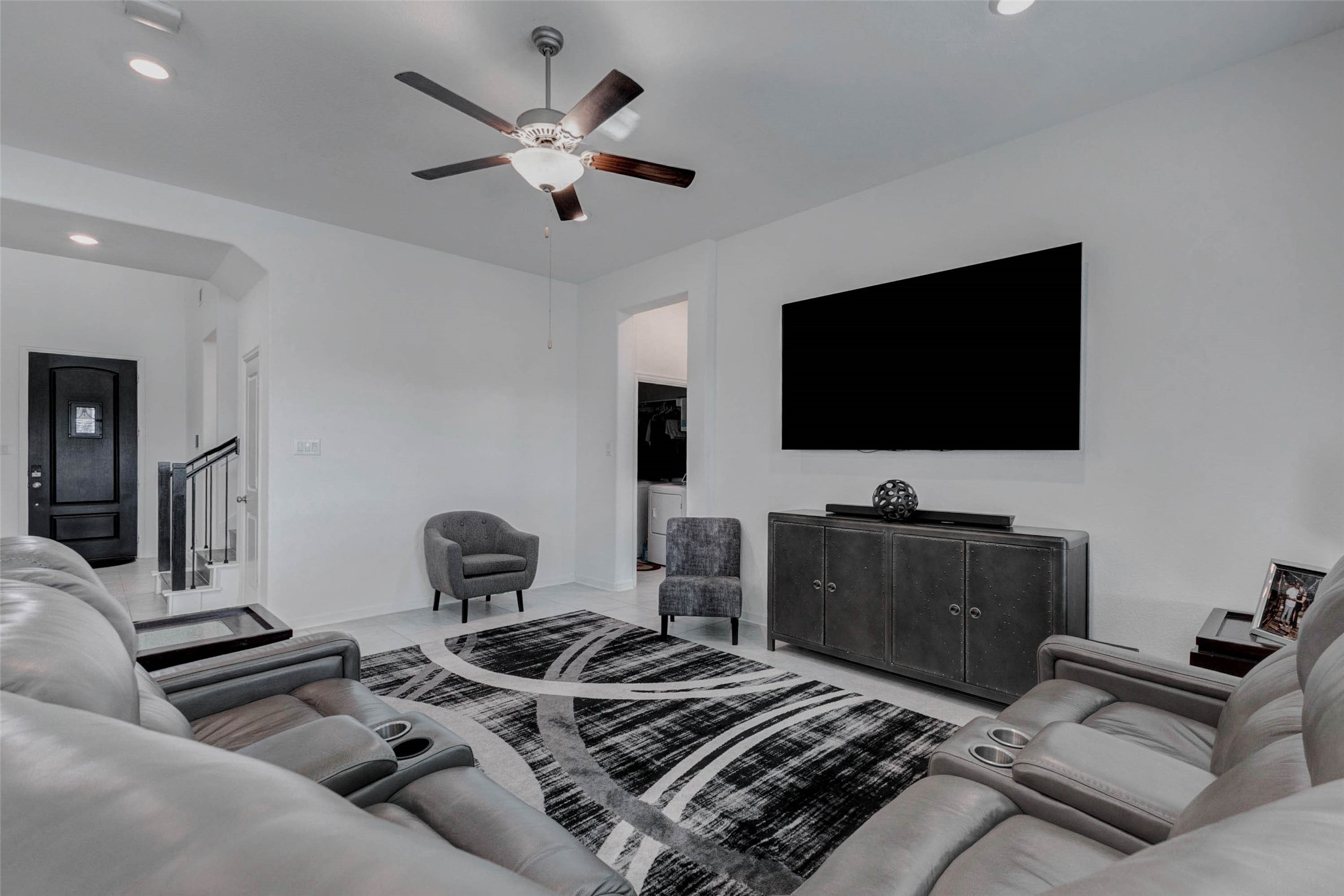 3711 Castle Rock Drive Rosenberg, TX 77469 - Photo 19 of 46 a bedroom with furniture and a flat screen tv